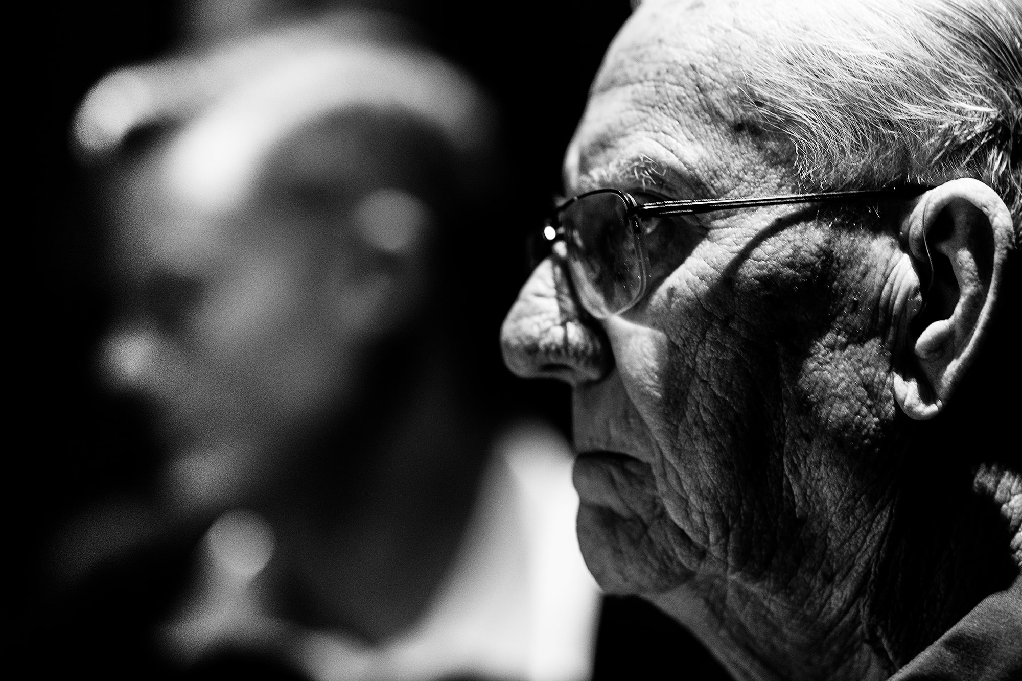 candid black and white photo of father and son dramatic