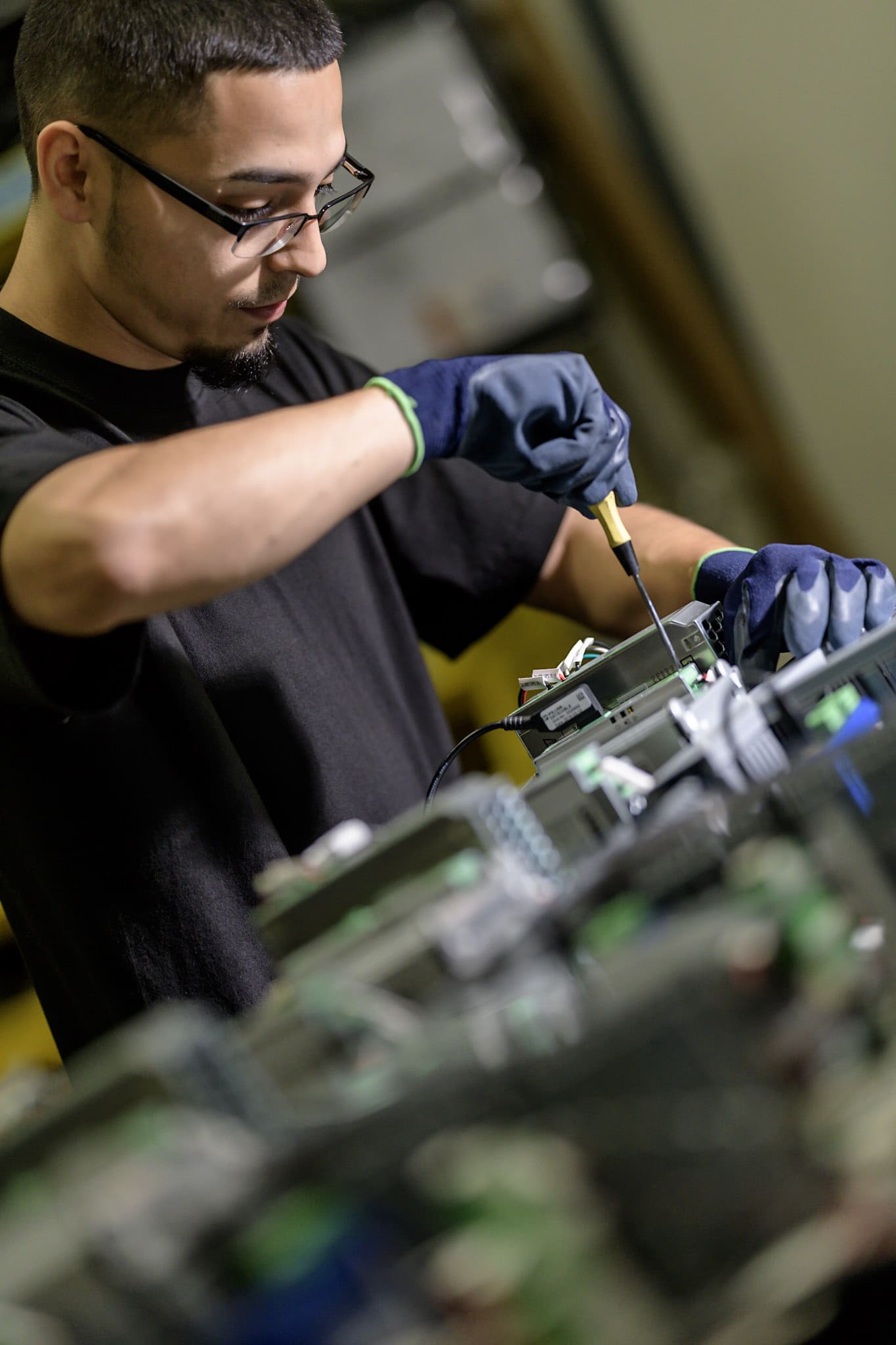 assembly line worked screws in parts for brochure photos