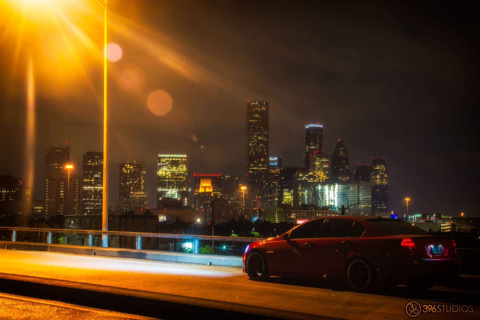 Red Pontiac G8 on a Bridge skyline houston
