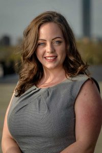 environmental headshot, pale eyes, woman business, williams tower