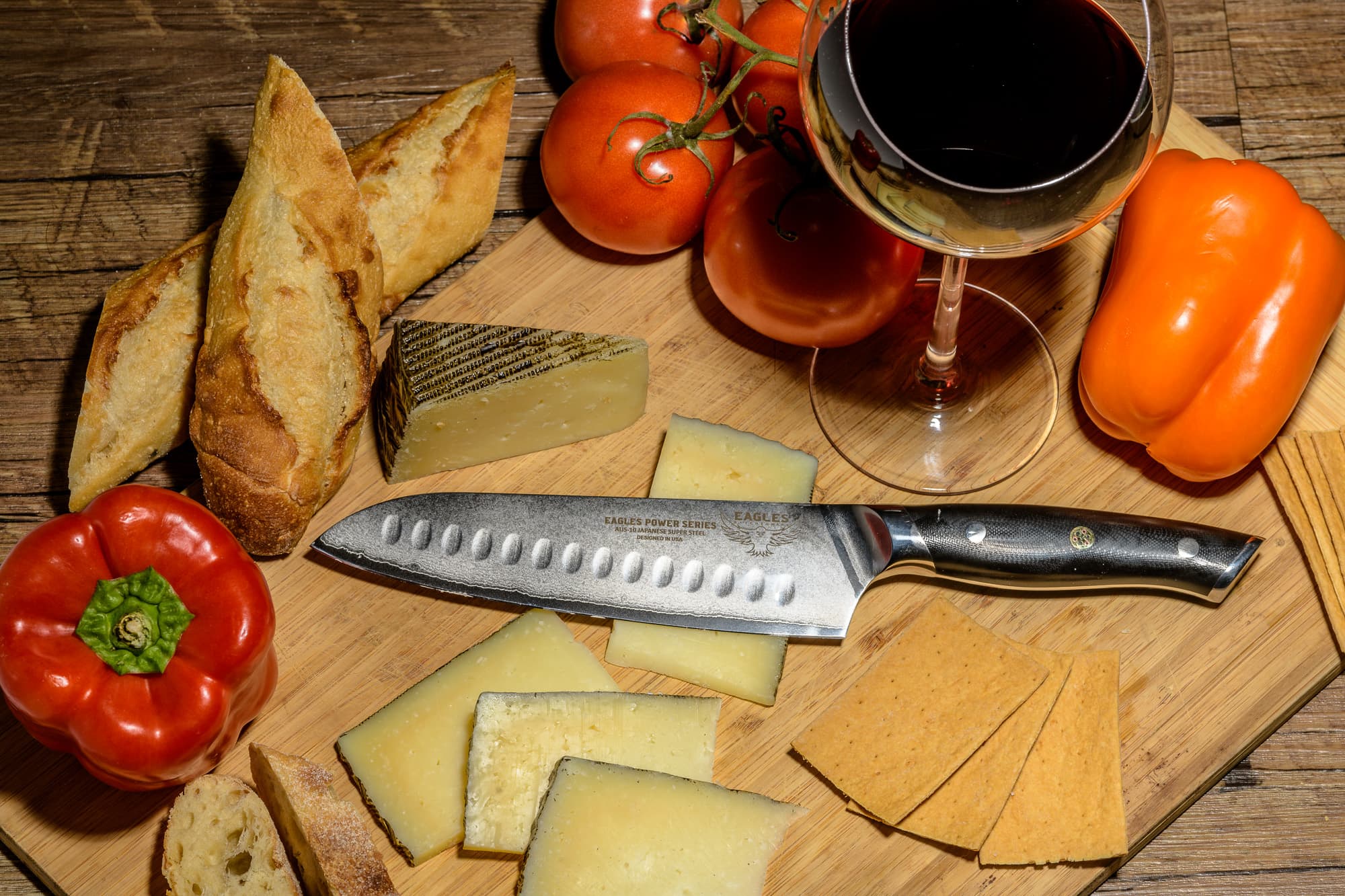chef santoku knife product photography wine and cheese wood