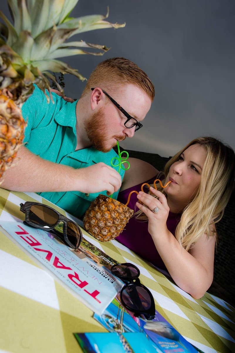 Freshly engaged couple announcing a destination wedding