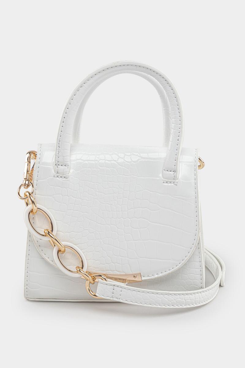 white alligator leather purse, gold details on white background