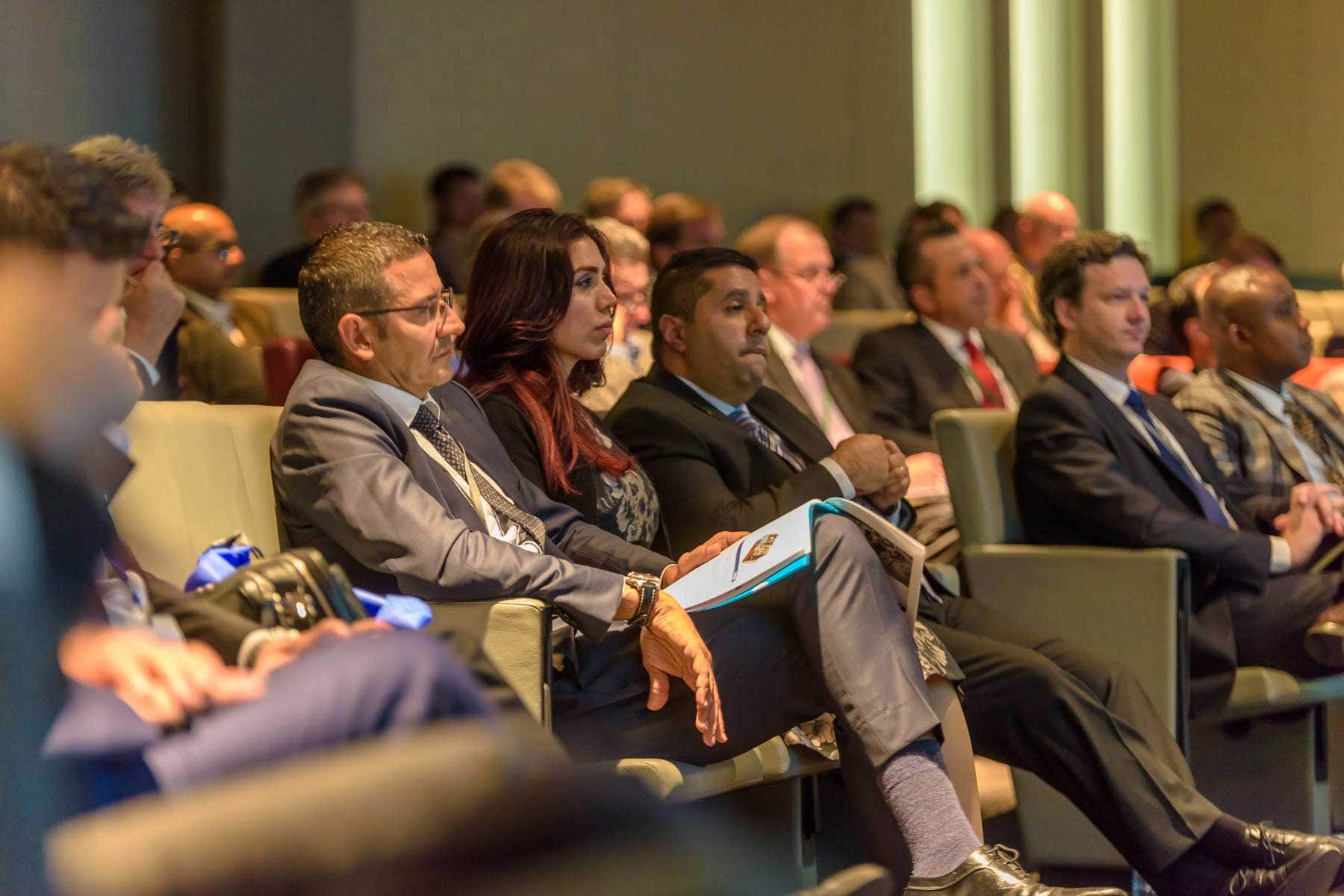 conference audience watches the speaker