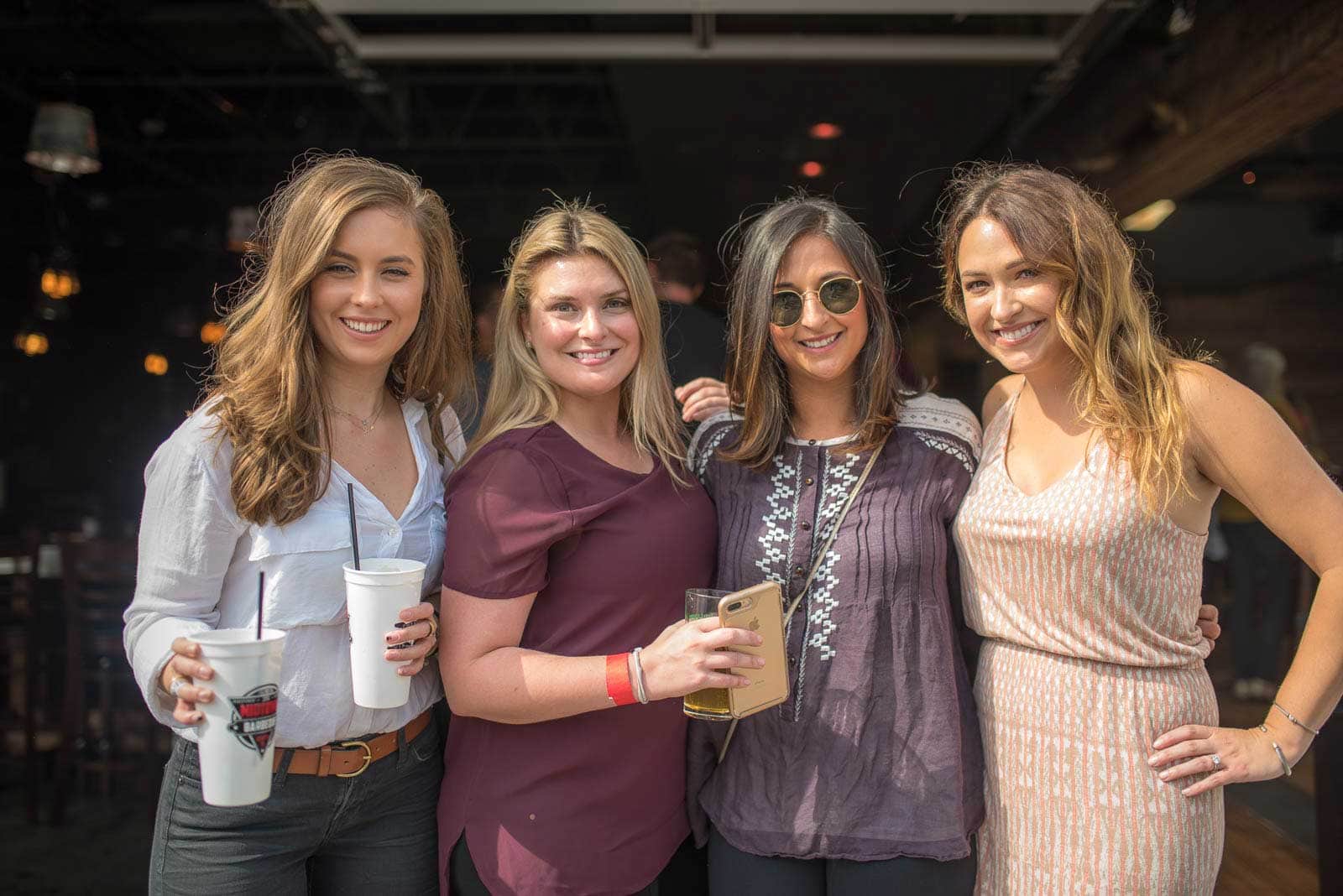 Group of women outside of a charity barbecue event