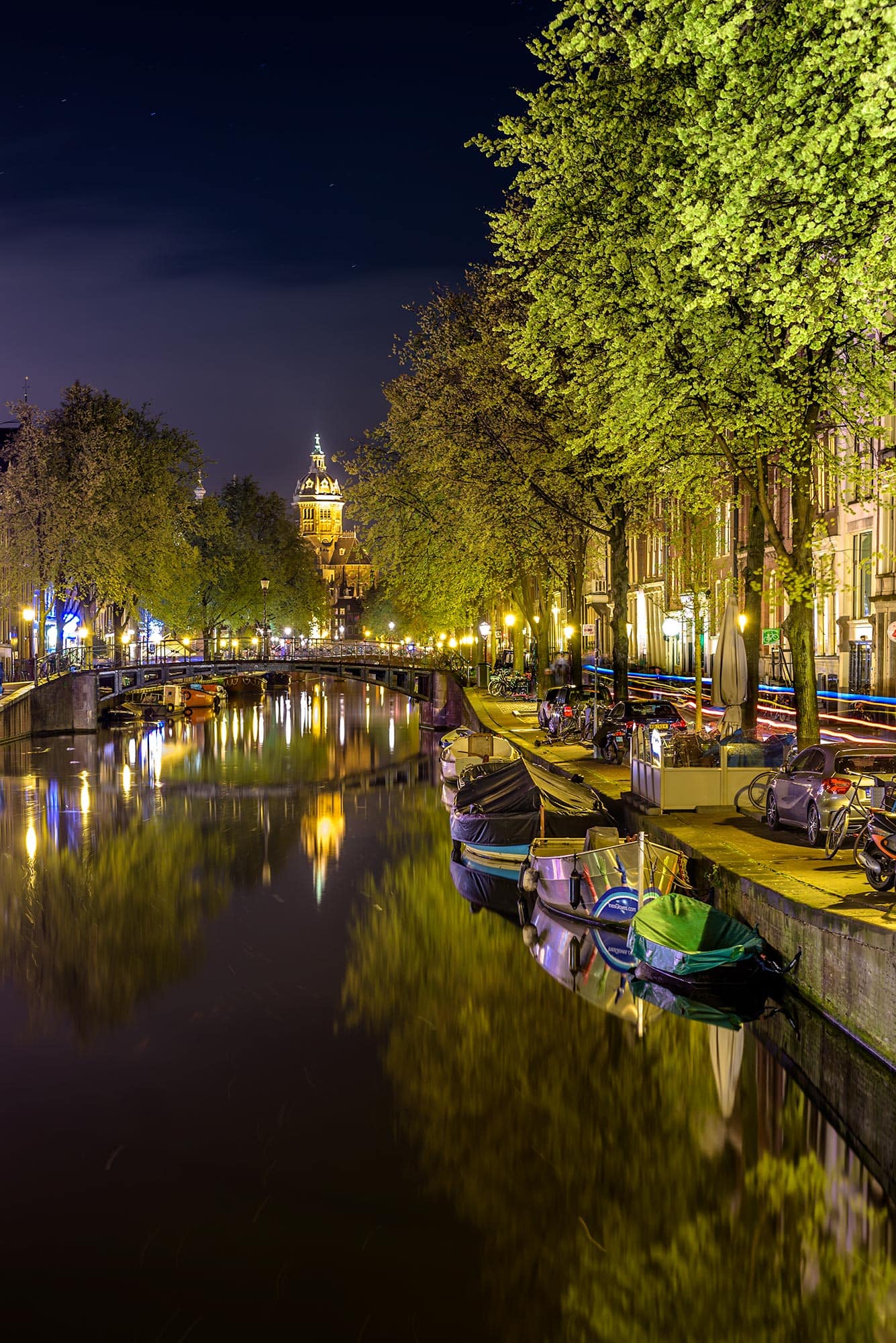 A canal with boats docked in it.