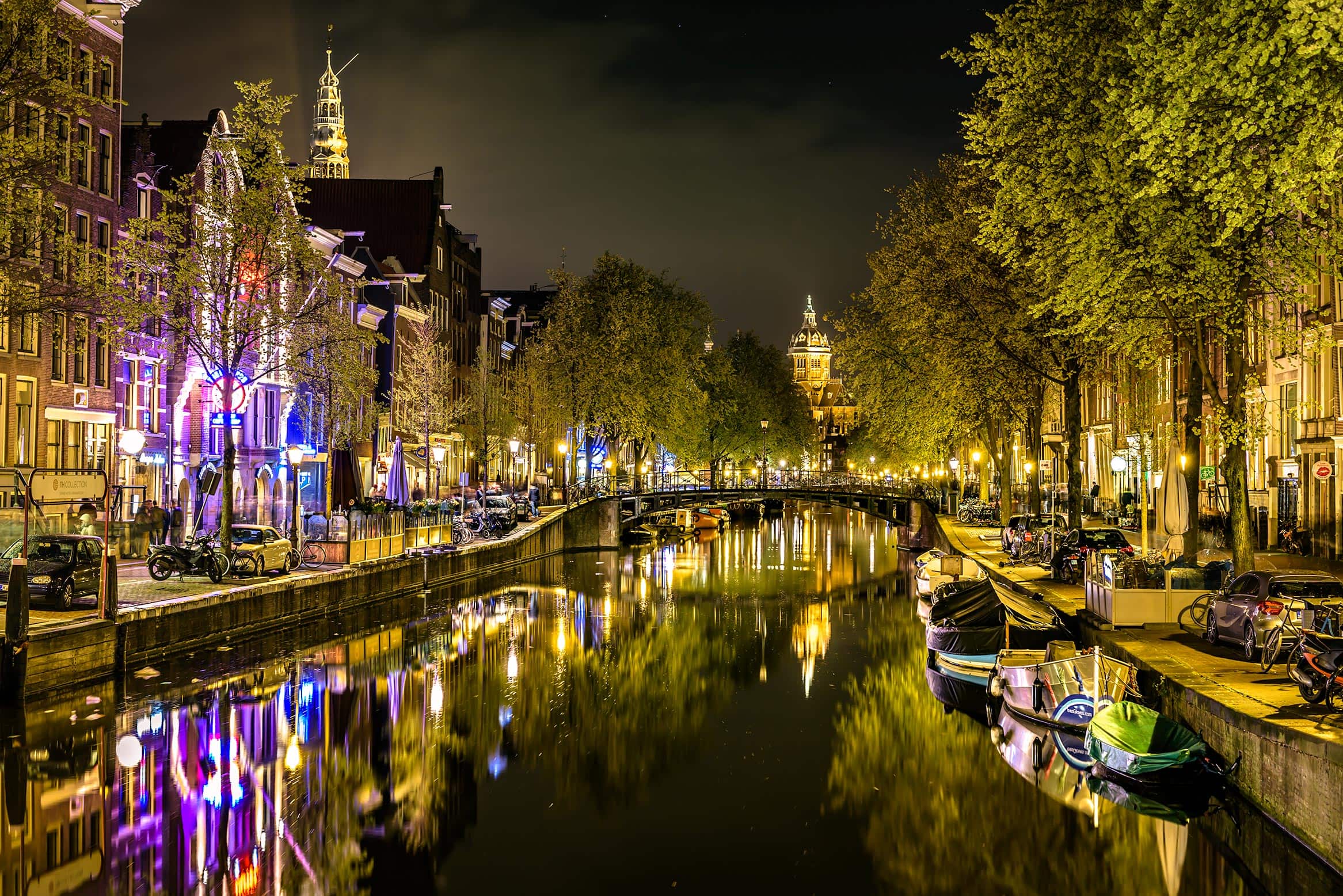 A canal with boats on it.