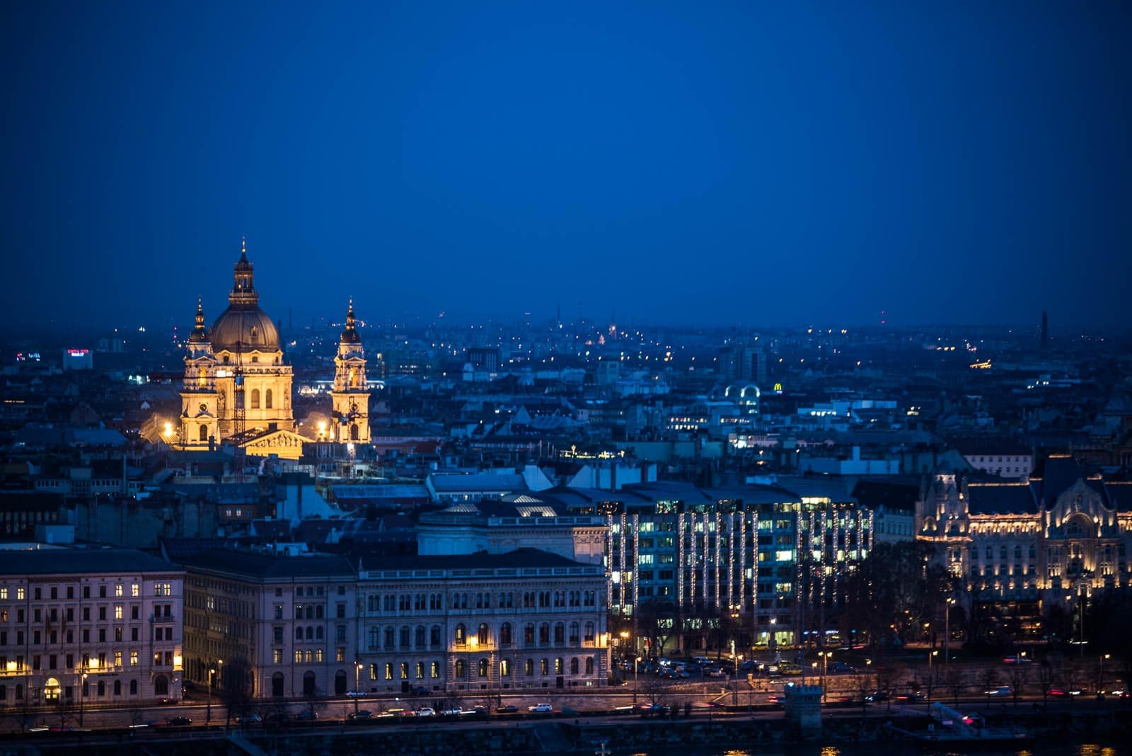 The city of budapest at night.