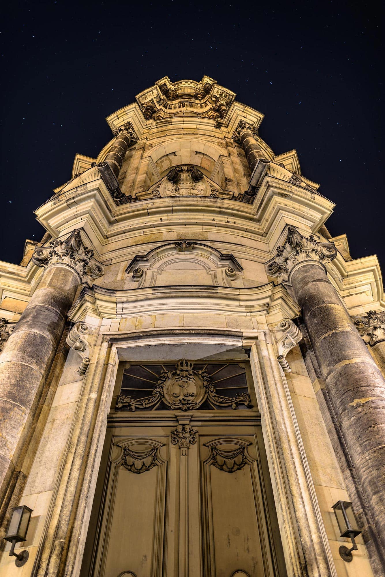 An ornate building at night.