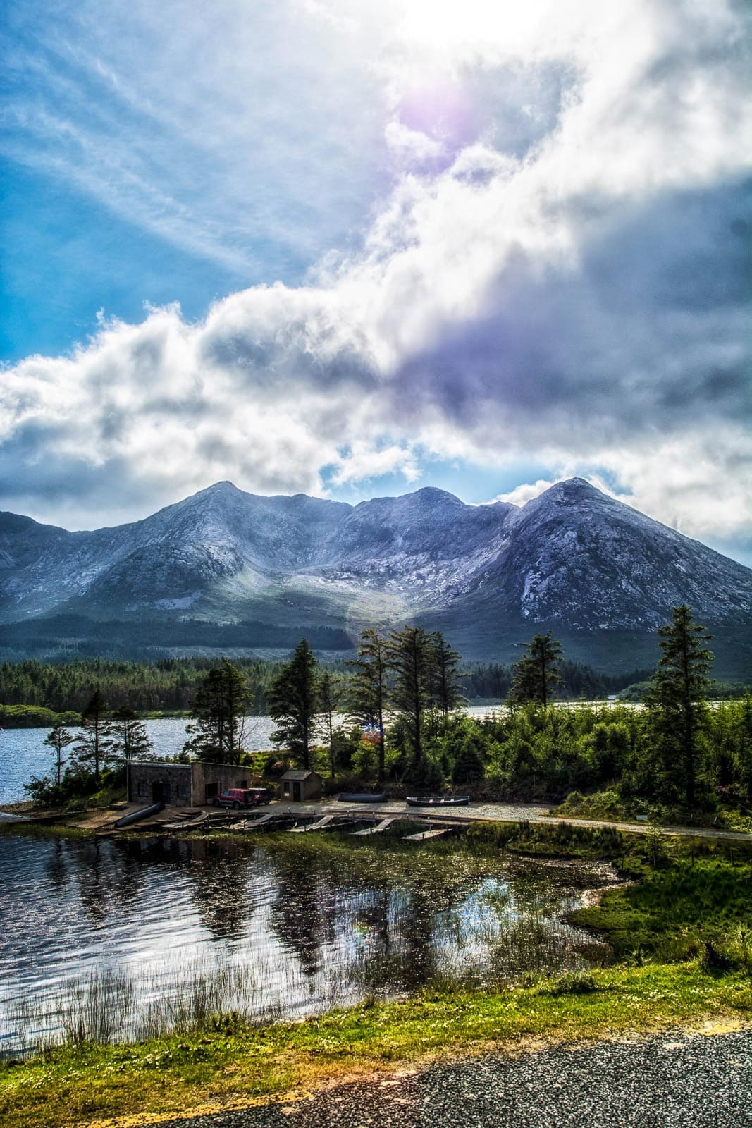 A lake with mountains in the background.