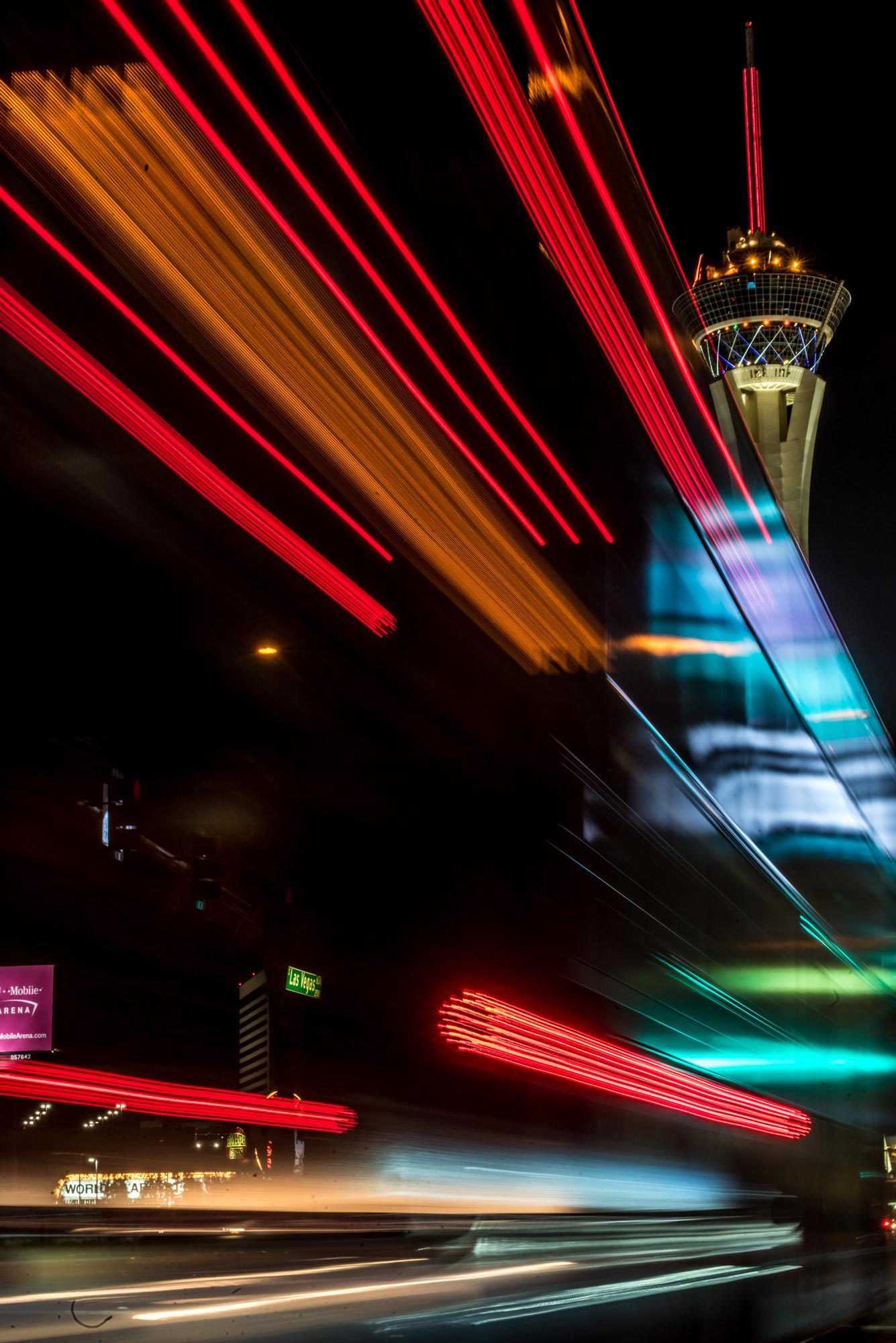 A blurry image of a building at night.