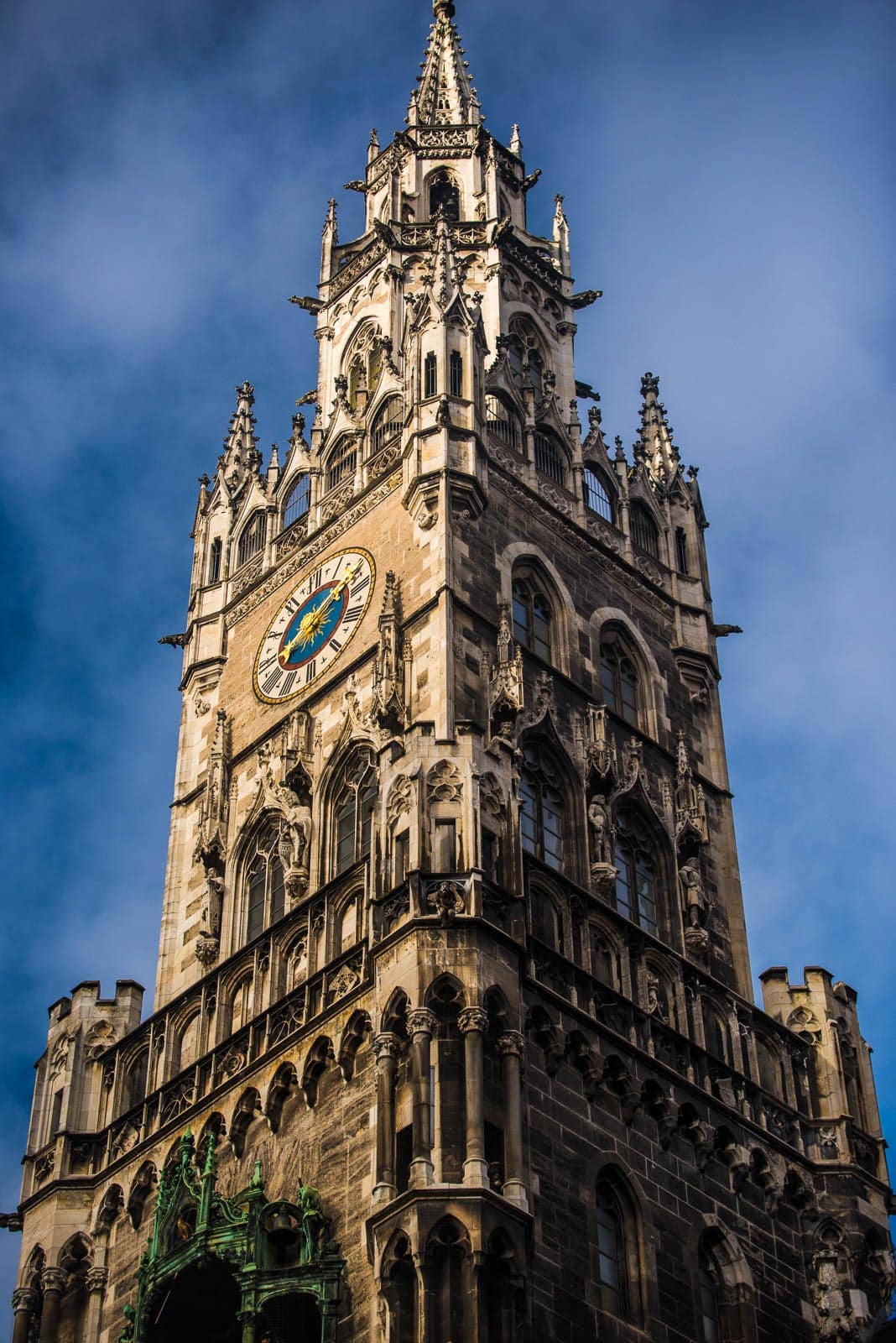 An ornate tower with a clock on top.