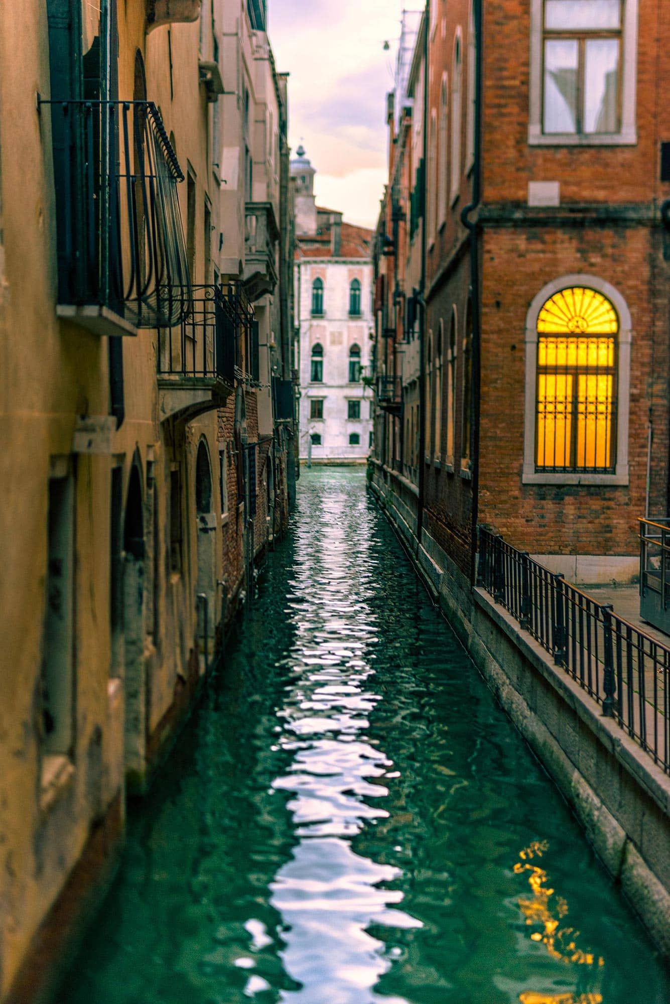 A narrow canal in venice, italy.