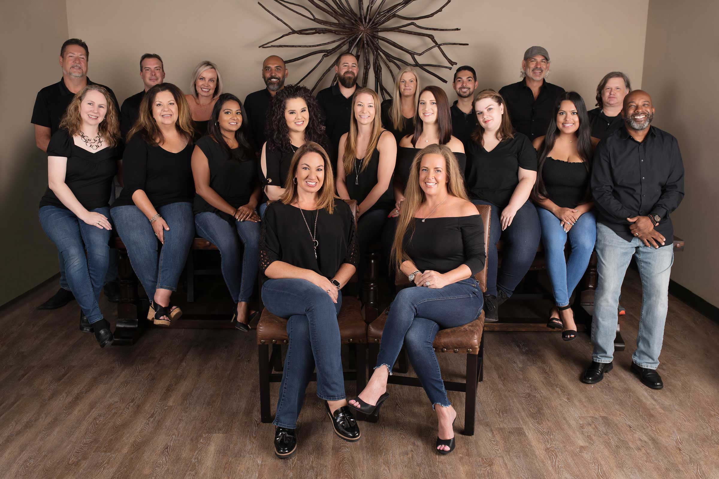 A creatively posed group of people captured by Chris Spicks Photography, a Houston-based photographer specialized in creative photography.